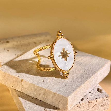 Bague ovale nacre blanche étoile dorée acier inoxydable